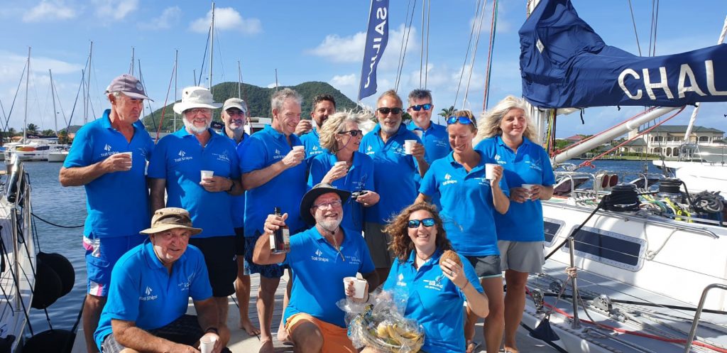 Photo of the First Class Sailing crew at the finish line in St Lucia